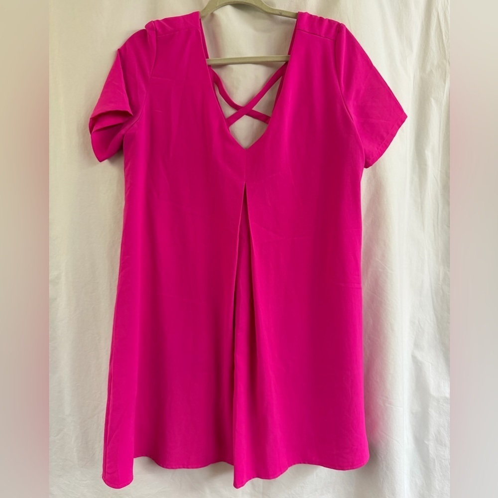 Vibrant Pink Women's mini dress with cris cross back detail